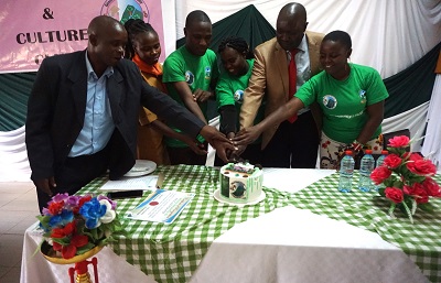 Environmental Clumbers Members cutting a cake