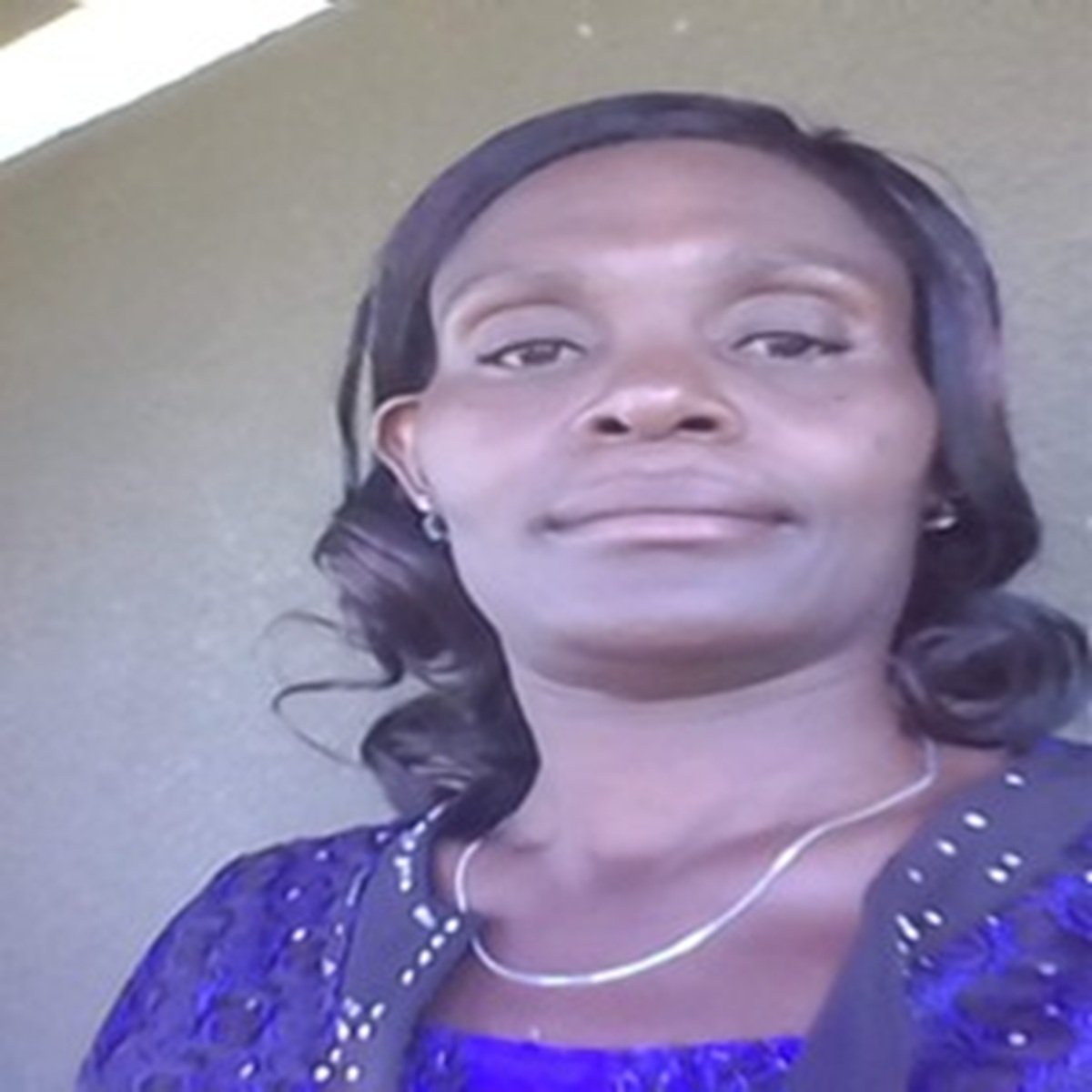 DR. CONSTANCE AMUSALA