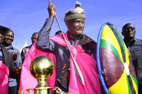 National Treasury and Economic Planning Cabinet Secretary John Mbadi receives a traditional Kuria hat, shield and spear from Kuria elders during the women empowerment programme in Kuria East, Migori County.