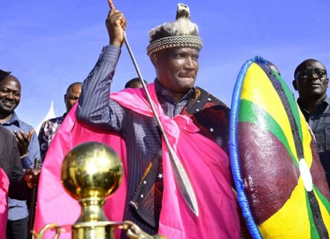 National Treasury and Economic Planning Cabinet Secretary John Mbadi receives a traditional Kuria hat, shield and spear from Kuria elders during the women empowerment programme in Kuria East, Migori County.