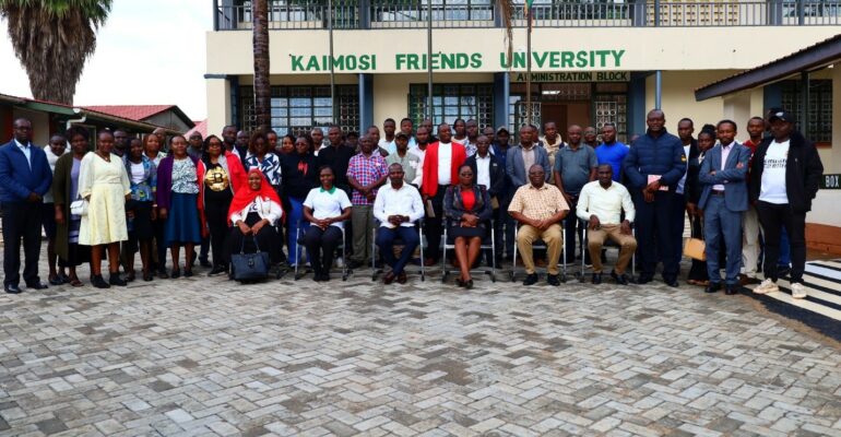 Participants and facilitators pose for a group photo after the successful e-GP sensitisation forum at Kaimosi Friends University.